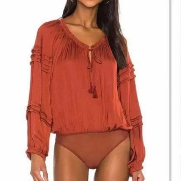 NWOT Free People Long sleeved Body Suit Orange balloon puff sleeve body suit - Picture 1 of 5